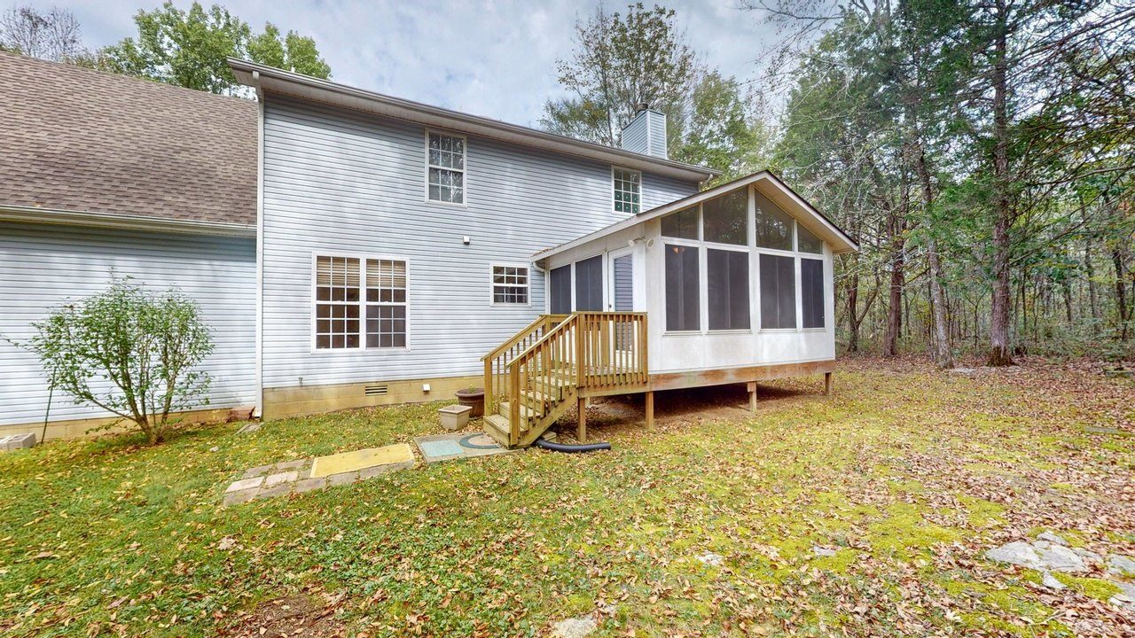 The back of the house and the sunroom